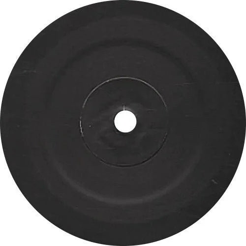 Lado A del vinilo Kenny Dixon Jr. – Jan Edits & Remixes Vol. 2, white label 12" reimpresión con etiqueta central negra sin texto visible.
