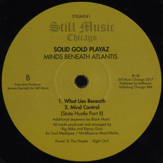 Contraportada del vinilo Solid Gold Playaz – Minds Beneath Atlantis publicado por Still Music. Texto impreso: lado B con títulos, créditos de producción y subtítulo “State Hustle Part II”.