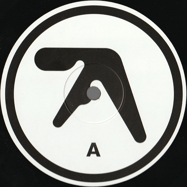  Etiqueta central del lado A del vinilo Aphex Twin – Selected Ambient Works 85-92, con el clásico logo de Aphex Twin y la letra A en negro.
