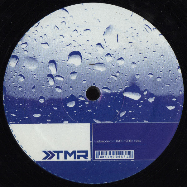 Etiqueta central del lado B del vinilo B.Dancer – Dreamin', 12" de Track Mode, gráfico azul con gotas de agua y código del sello visible.