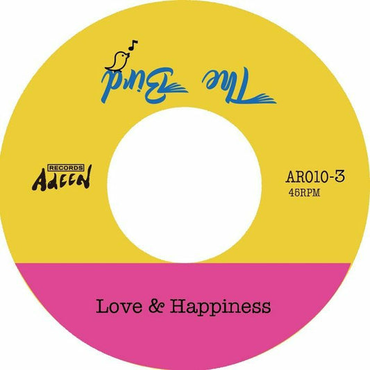 Etiqueta central del vinilo 7" Cad73 – The Bird Part 3 en su lado A, con fondo amarillo y rosa, incluye el tema “Love & Happiness”, catálogo Adeen AR010-3.