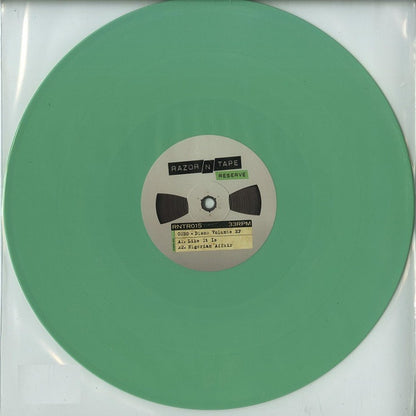 Vinilo 12" verde del Disco Volante EP de COEO publicado por Razor-N-Tape Reserve. Texto impreso: lado A – listado de temas y sello.
