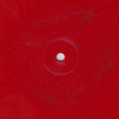 Lado B del vinilo DJ Willie Oboe – Slyness, 12" rojo estampado de Börft Records, cara sin etiqueta visible mostrando el color rojo intenso del prensado.