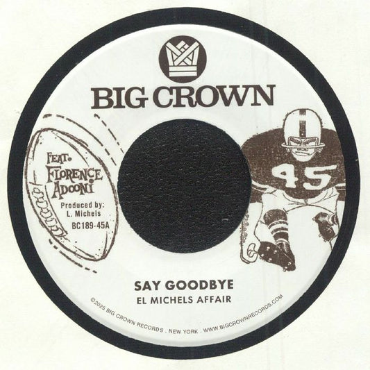 Etiqueta central del lado A del vinilo El Michels Affair – Say Goodbye / Magica editado por Big Crown Records, formato 7" 45 RPM. Diseño retro en blanco y marrón con ilustración de jugador de fútbol americano y créditos de producción de L. Michels visibles.