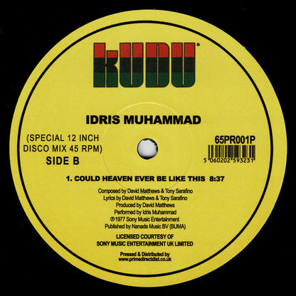 Etiqueta central amarilla del vinilo Idris Muhammad – Could Heaven Ever Be Like This (Late Nite Tuff Guy Remix) en reedición 12" de Kudu, lado B con la versión original de 8:37 y catálogo visible.