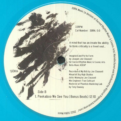 Contraportada del vinilo "The Ascension Of Light And Wisdom" de Joaquin Joe Claussell, publicado por SORA en 10" azul. Incluye lista de canciones, créditos y frase inspiradora.