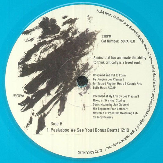 Contraportada del vinilo "The Ascension Of Light And Wisdom" de Joaquin Joe Claussell, publicado por SORA en 10" azul. Incluye lista de canciones, créditos y frase inspiradora.