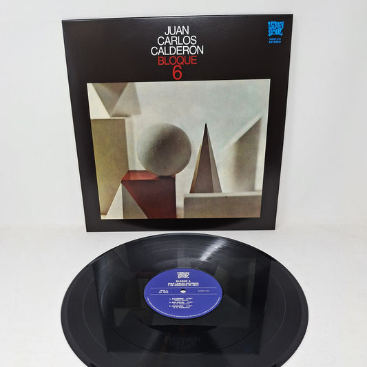 Vinilo Juan Carlos Calderon – Bloque 6 junto a la portada; lado A negro con etiqueta azul de Vampi Soul.
