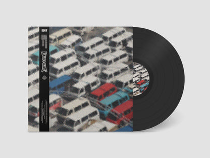 Vinilo Kamazu & Caravan – Ungiphatha Kahle mostrado parcialmente en funda con arte de combis sobre fondo neutro.