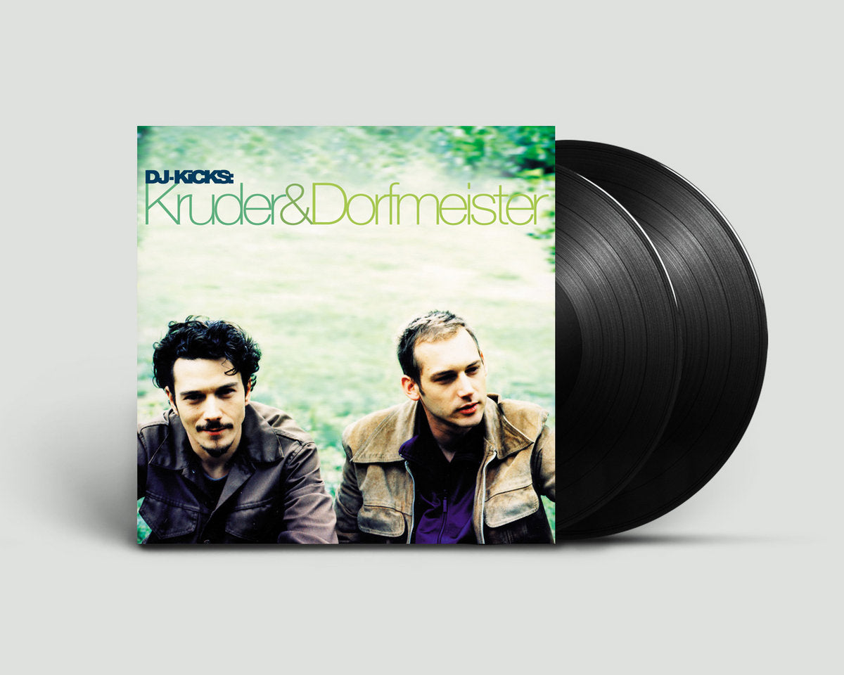 Edición 2 x vinilo 12" del álbum Kruder & Dorfmeister – DJ-Kicks de !K7 Records, mostrando la portada junto a los dos discos negros ligeramente sobresalientes, reedición para coleccionistas y DJs.