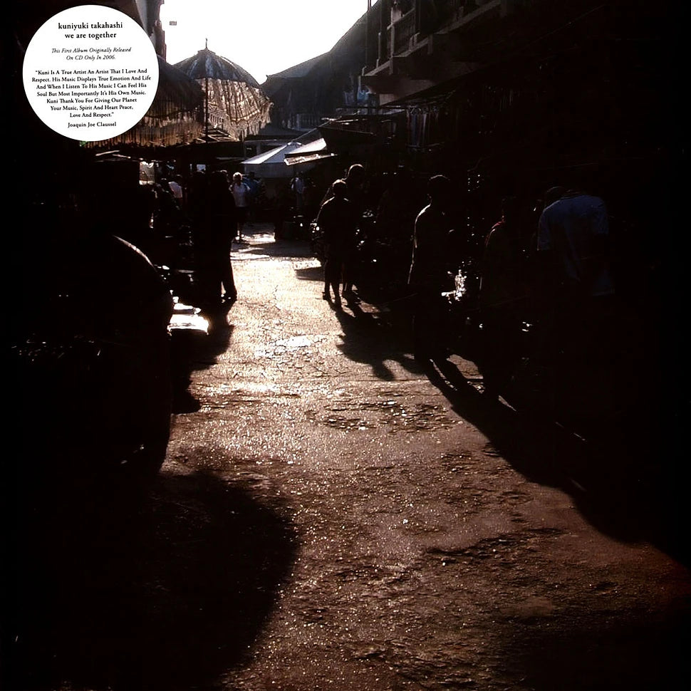 Portada del vinilo Kuniyuki Takahashi – We Are Together en Mule Musiq, con fotografía urbana iluminada por un sol intenso.