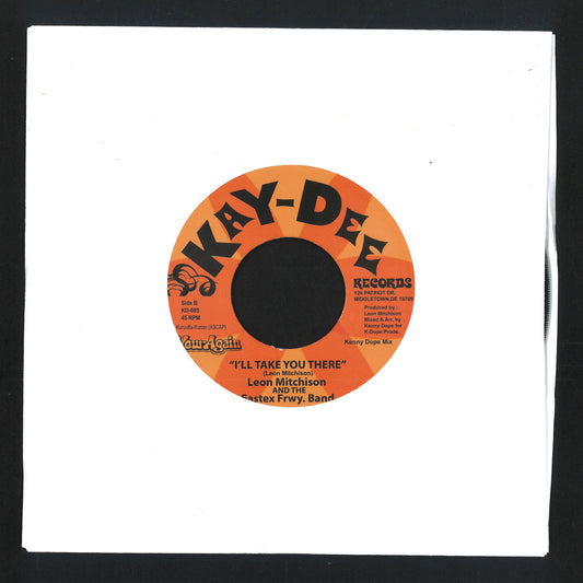 Etiqueta del lado B del vinilo 7" de Leon Mitchison & the Eastex Freeway Band – What Cha Need / I'll Take You There, con título “I’ll Take You There” y estética clásica de Kay-Dee Records sobre funda blanca.