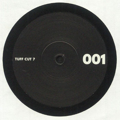 Etiqueta central negra del vinilo LNTG – The Day Is Lovely / Love About en formato 7" promo, con el logo Tuff Cut 7 y número de catálogo 001 en tipografía blanca.