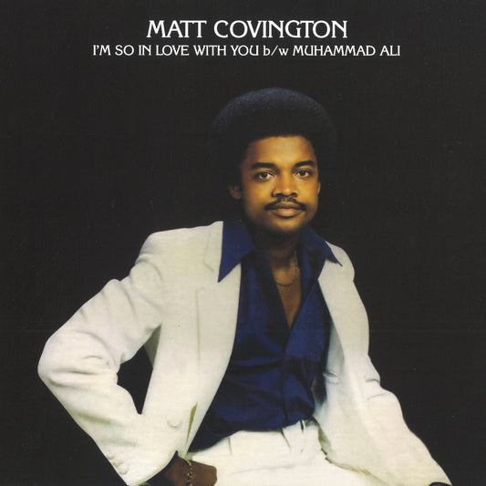 Portada del vinilo 7" de Matt Covington – I'm So In Love With You b/w Muhammad Ali en April Records, con foto elegante del artista en traje blanco