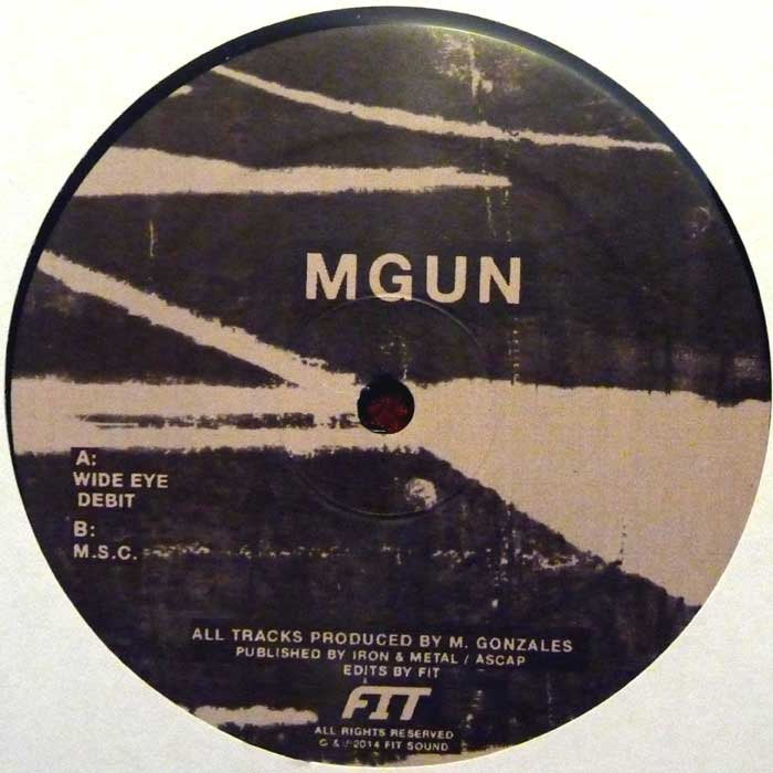 Lado A del vinilo MGUN – MGUN EP, con etiqueta en negro y crema, títulos de las tres pistas y logo FIT.