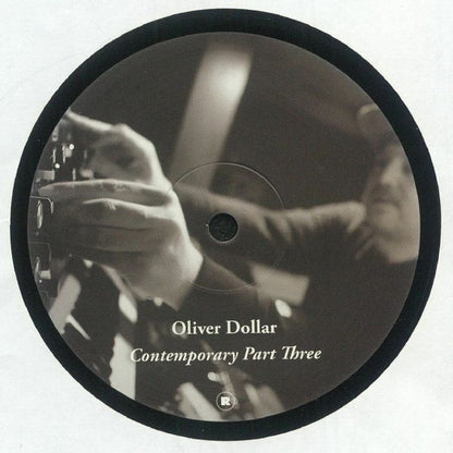 Portada delantera del vinilo Oliver Dollar – Contemporary Part Three editado por Rekids en formato 12". Texto impreso: créditos de producción y lista de temas de los lados A y B.