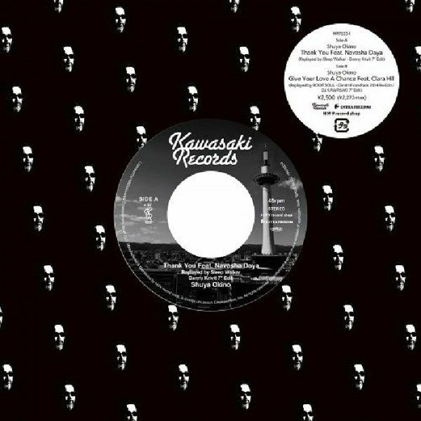 Vinilo 7" de Shuya Okino – Thank You (Danny Krivit, Dimitri From Paris / DJ Kawasaki Mixes) con etiqueta Kawasaki Records lado A a 45 RPM y pista Thank You feat. Navasha Daya sobre funda negra con patrón de rostros.