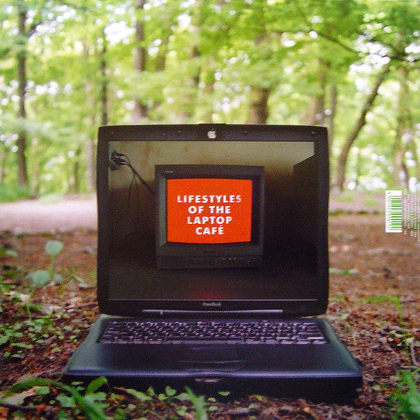 Contraportada del vinilo The Other People Place – Lifestyles Of The Laptop Café, laptop en el bosque mostrando el título del álbum sobre fondo rojo.