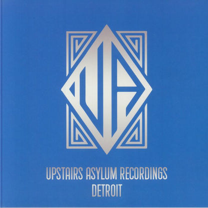 Portada del vinilo V.A. – Detroit On The Move Vol. 1, lanzado por Upstairs Asylum Recordings en formato 12". Diseño con logo metálico sobre fondo azul.