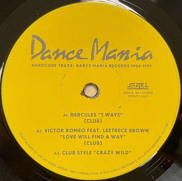 Etiqueta del lado A del vinilo con los temas de Hercules, Victor Romeo y Club Style. Texto impreso: logo Dance Mania y número de catálogo STRUT114LP.