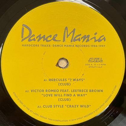 Etiqueta del lado A del vinilo con los temas de Hercules, Victor Romeo y Club Style. Texto impreso: logo Dance Mania y número de catálogo STRUT114LP.