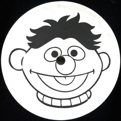 Portada delantera del vinilo Varios Artistas – TTJ Edits #5725 lanzado por TTJ en formato 12". Diseño en blanco y negro con una ilustración caricaturesca.