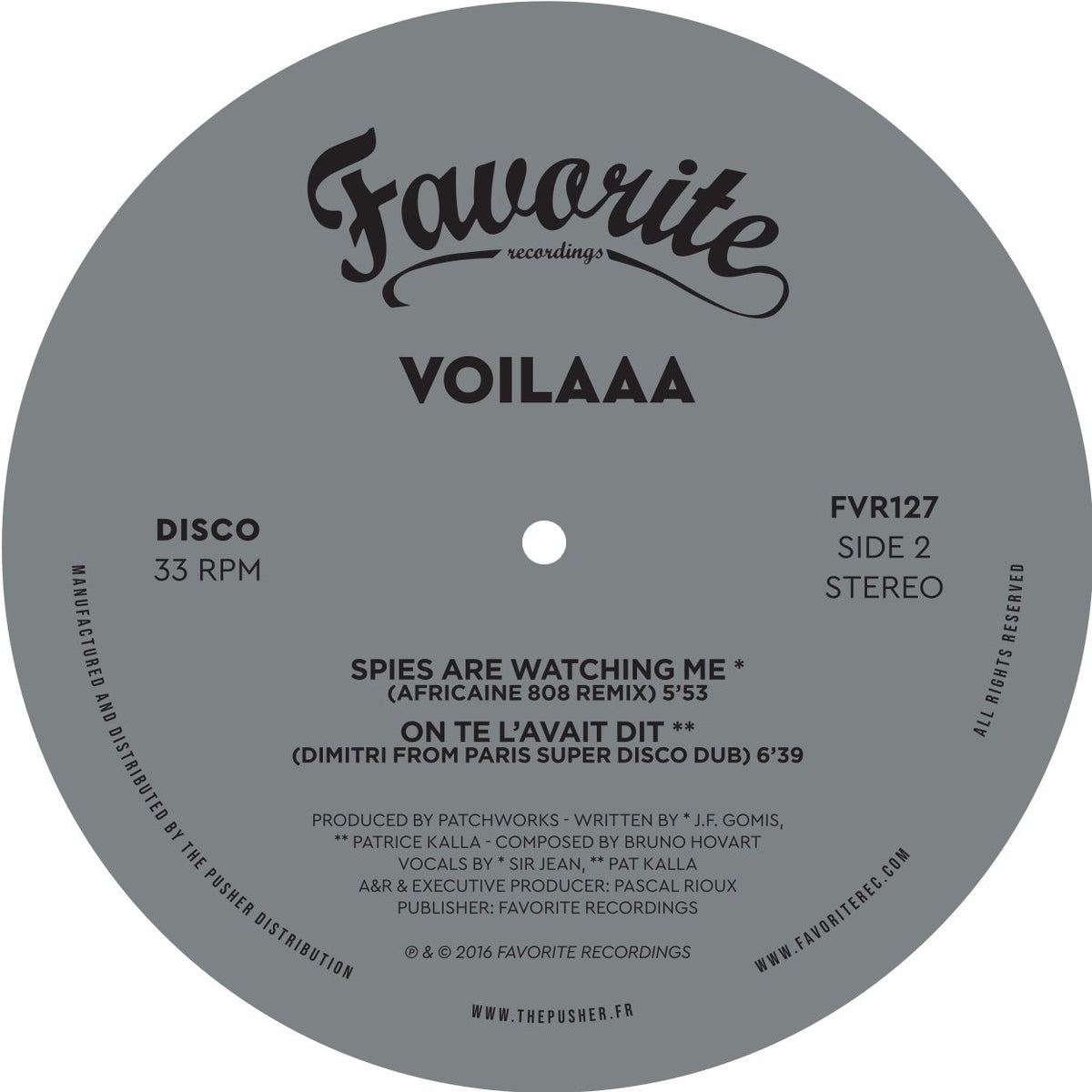 Lado B del vinilo Voilaaa – On Te L’Avait Dit / Spies Are Watching Me (Remixes), etiqueta gris con dos remixes y 33 RPM.