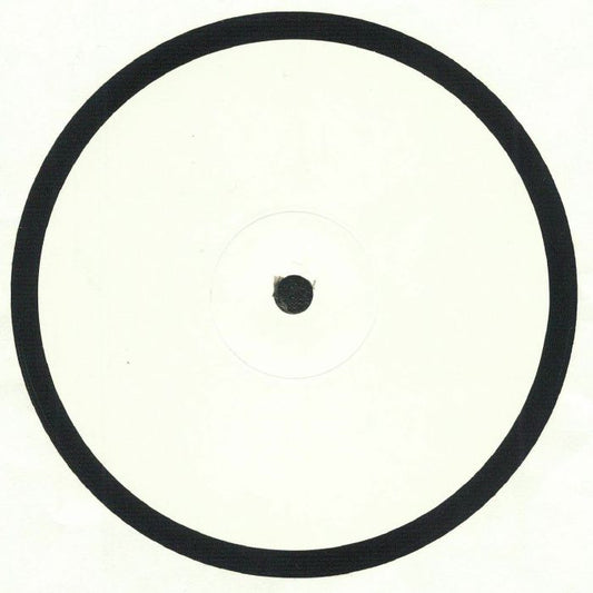 Lado B del vinilo Wax – No. 90009, white label 12" del sello Wax, cara sin impresión con etiqueta blanca lisa y anillo negro exterior.